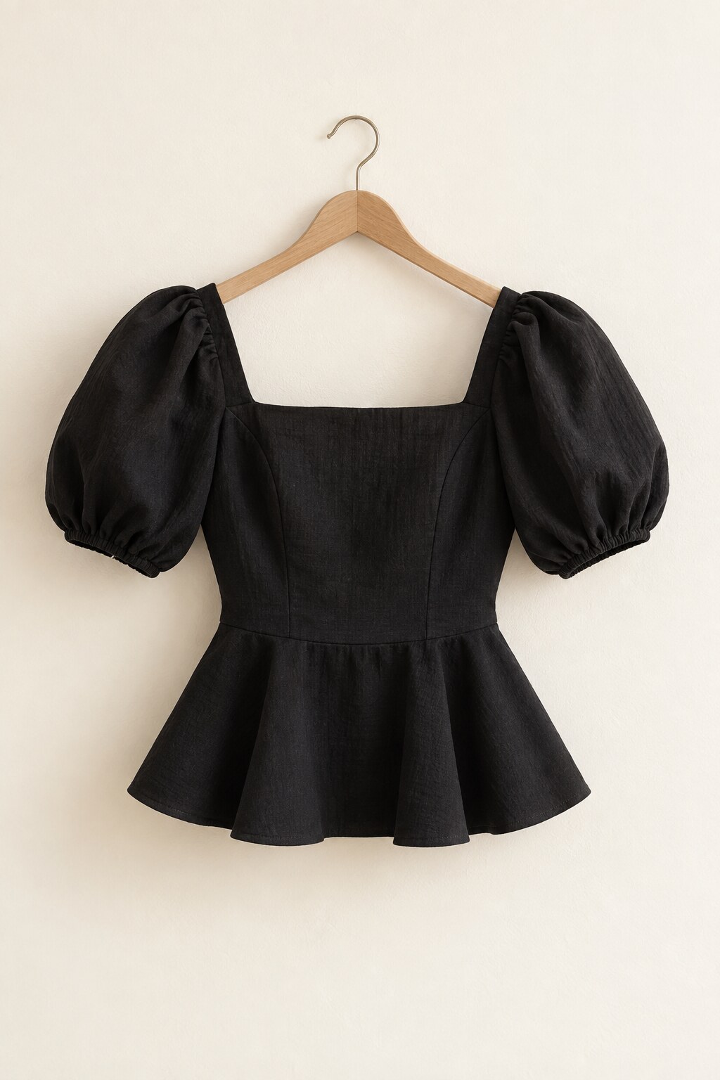 Black square-neck puff-sleeve peplum top